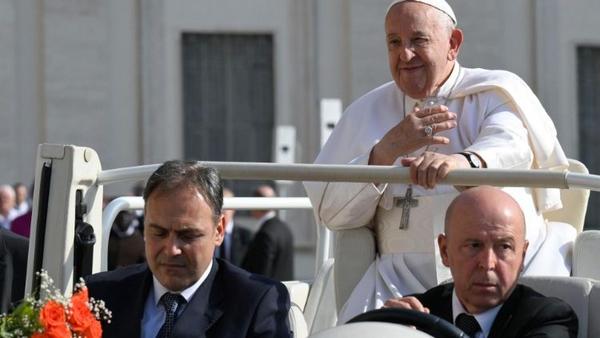 Pope Francis on the Pope mobile, front view