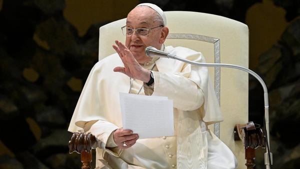 Pope preaching from his chair and waving to the crowds